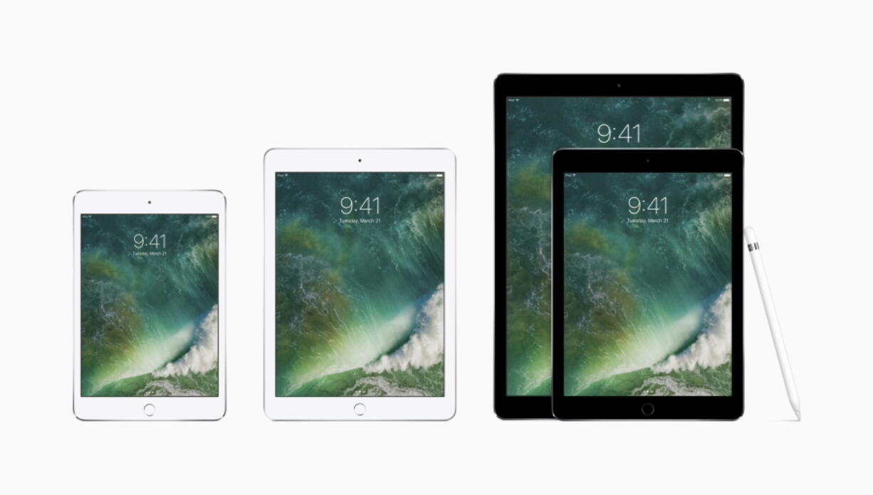 The family of iPads, from left, the iPad mini 4, the new iPad, the 9.7-inch iPad Pro and the 12.9-inch one, along with the Apple Pencil.