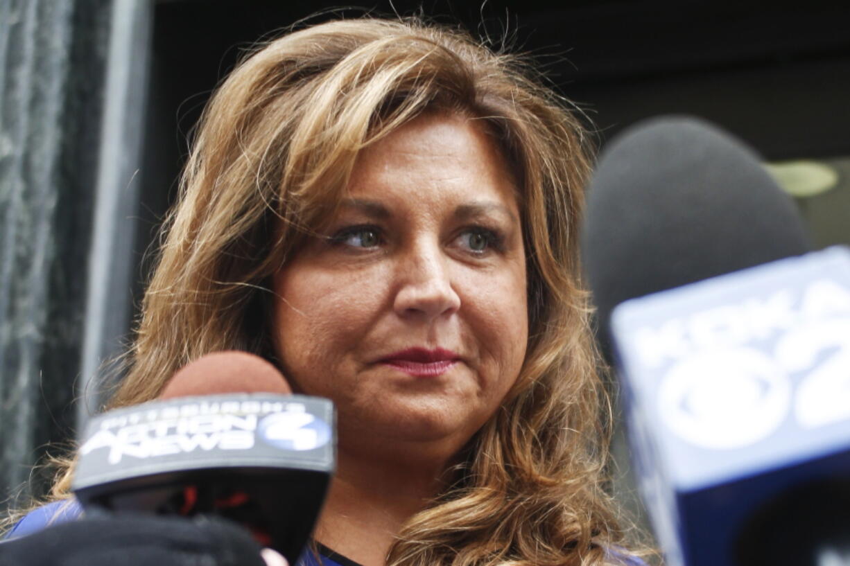 &quot;Dance Moms&quot; star Abby Lee Miller leaves federal court after pleading guilty in Pittsburgh to bankruptcy fraud and failing to report thousands of dollars in Australian currency she brought into the country. Miller posted on Instagram March 26, 2017, that she quit the Lifetime series.