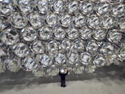 Engineer Volkmar Dohmen stands in front of xenon short-arc lamps in the DLR German national aeronautics and space research center in Juelich, western Germany. The lights are part of an artificial sun that will be used for research purposes.