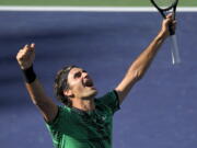 Roger Federer, of Switzerland, celebrates his win against Stan Wawrinka, also of Switzerland, in their final match at the BNP Paribas Open tennis tournament, Sunday, March 19, 2017, in Indian Wells, Calif. (AP Photo/Mark J.