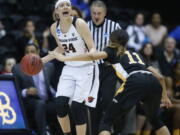 Oregon State&#039;s Sydney Wiese (24) brings the ball upcourt while guarded by Long Beach State&#039;s Martina McCowan (11) during the second half of a first-round game in the women&#039;s NCAA college basketball tournament Friday, March 17, 2017, in Corvallis, Ore. (AP Photo/ Timothy J.