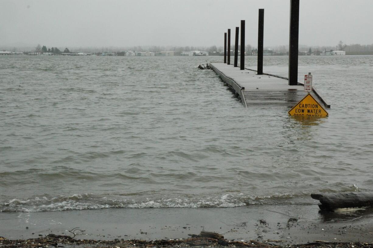 Anglers will need to wear hip boots, or possibly waders, if they want to use the dock at Marine Park along the Columbia River in Vancouver. Despite the sign, there's little chance of doing much prop damage.