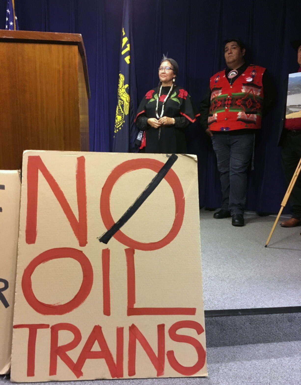 Native Americans Cathy Sampson-Cruse, left, and Raymond Estrada appear at a news conference at the Oregon State Capitol on Monday in Salem, Ore., in support of two bills.