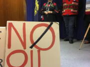 Native Americans Cathy Sampson-Cruse, left, and Raymond Estrada appear at a news conference at the Oregon State Capitol on Monday in Salem, Ore., in support of two bills.