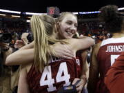 Stanford&#039;s Alanna Smith embraces Karlie Samuelson (44) after the team beat Oregon State in the Pac-12 Tournament championship NCAA college basketball game, Sunday, March 5, 2017, in Seattle. Stanford won 48-43.