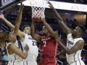 Washington State&#039;s Ike Iroegbu (2) shoots against Colorado&#039;s Xavier Johnson, left, Derrick White, second from left, and Wesley Gordon during the second half of an NCAA college basketball game in the first round of the Pac-12 men&#039;s tournament Wednesday, March 8, 2017, in Las Vegas. Colorado won 73-63.