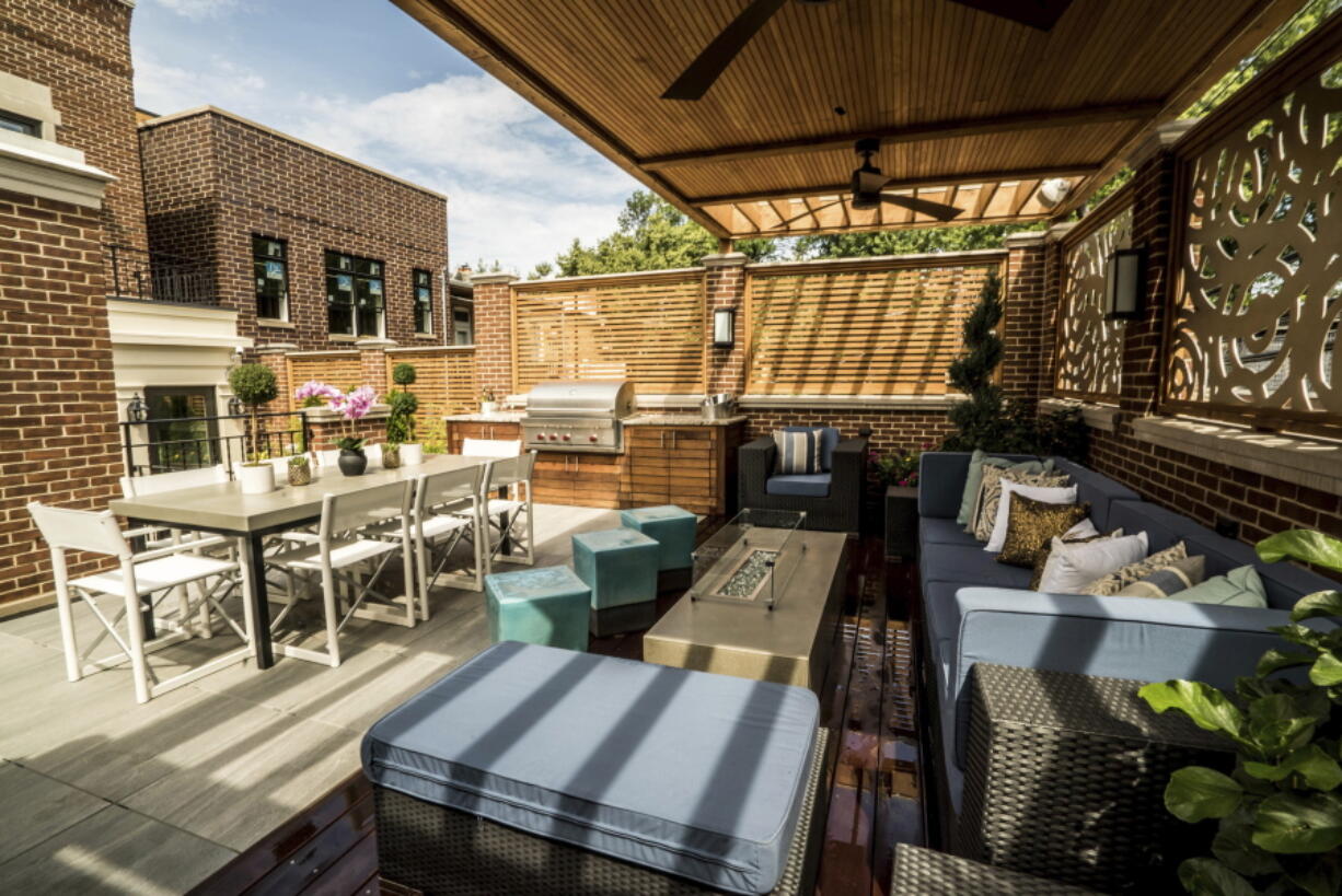 A roof deck in Chicago designed by Chicago Roof Deck and Garden. Urban dwellers are looking up for outdoor living inspiration, installing rooftop decks complete with kitchens, lounges, gardens and entertaining spaces.