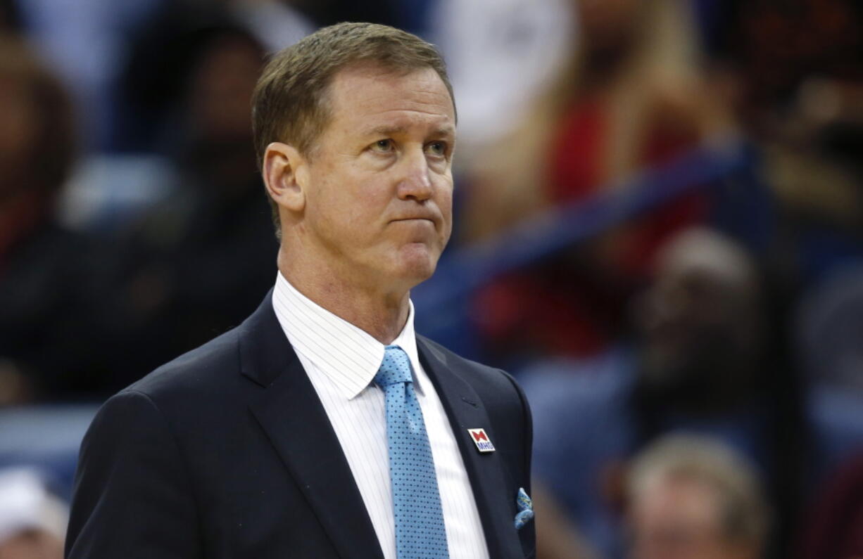 Portland Trail Blazers head coach Terry Stotts walks along the bench in the first half of an NBA basketball game against the New Orleans Pelicans in New Orleans, Tuesday, March 14, 2017.