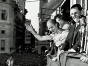 President Juan Peron and his wife Eva wave Oct. 17, 1950 from the balcony of Casa Rosada, Government House, in Buenos Aires as Argentina celebrated Loyalty Day. Decades after Eva Peron&#039;s death, tourists still visit the site where she greeted adoring masses from the balcony.