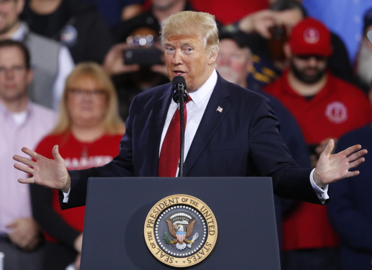 President Donald Trump speaks at the American Center for Mobility on Wednesday in Ypsilanti Township, Mich.