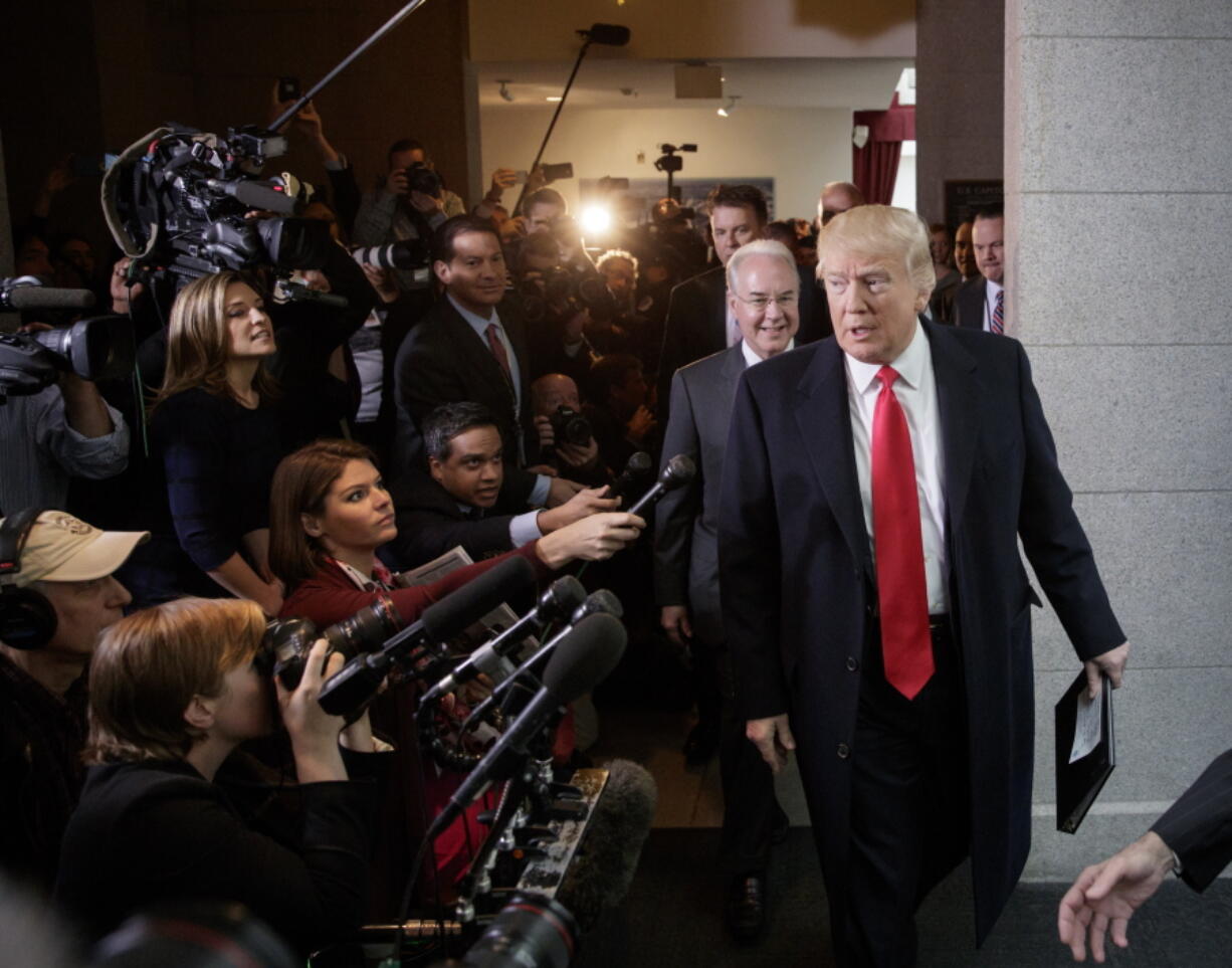 President Donald Trump and Health and Human Services Secretary Tom Price on Capitol Hill in Washington on  Tuesday to rally support for the Republican health care overhaul by taking his case directly to GOP lawmakers. (AP Photo/J.