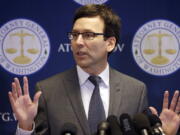 Washington State Attorney General Bob Ferguson speaks at a news conference Thursday, March 9, 2017, about the state&#039;s response to President Donald Trump&#039;s revised travel ban in Seattle. Legal challenges against Trump&#039;s revised travel ban mounted Thursday as Washington state said it would renew its request to block the executive order. It came a day after Hawaii launched its own lawsuit, and Ferguson said both Oregon and New York had asked to join his state&#039;s legal action.