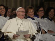 Pope Francis shares a light moment during his historic visit to the Anglican Church of All Saints in Rome on Feb. 26.