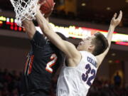 Gonzaga&#039;s Zach Collins, right, defends Pacific&#039;s T.J. Wallace during the second half of a West Coast Conference tournament NCAA college basketball game Saturday, March 4, 2017, in Las Vegas. Gonzaga defeated Pacific 82-50.