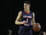 Nathan Hale forward Michael Porter Jr. dribbles downcourt against Garfield in the first half of the Washington state March 4, 2017, in Tacoma, Wash. (AP Photo/ (Ted S.