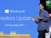 Terry Myerson, Microsoft&#039;s executive vice president of the Windows and Devices Group, discusses a Windows 10 update at a Microsoft media event in October in New York. The major update to Microsoft&#039;s Windows 10 system will start reaching consumers and businesses on April 11. New features in the Creators Update include 3-D drawing tools, game-broadcasting capabilities and the ability to annotate maps and photos. Microsoft also is changing its update procedures to make them less disruptive.