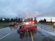 Two people were injured in a head-on crash that involved three vehicles Wednesday evening near Battle Ground.