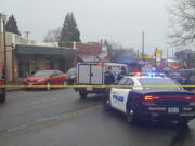 Vancouver police cordon off a section of Main Street in Uptown Village on Saturday while investigating a suspected explosive device found on a sidewalk in the 2300 block of Main Street. The items were later removed by bomb squad personnel.