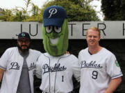 Seahawks punter Jon Ryan, right, said part of why he invested in the Portland Pickles baseball team is to put down roots in the Northwest after his NFL days are done.