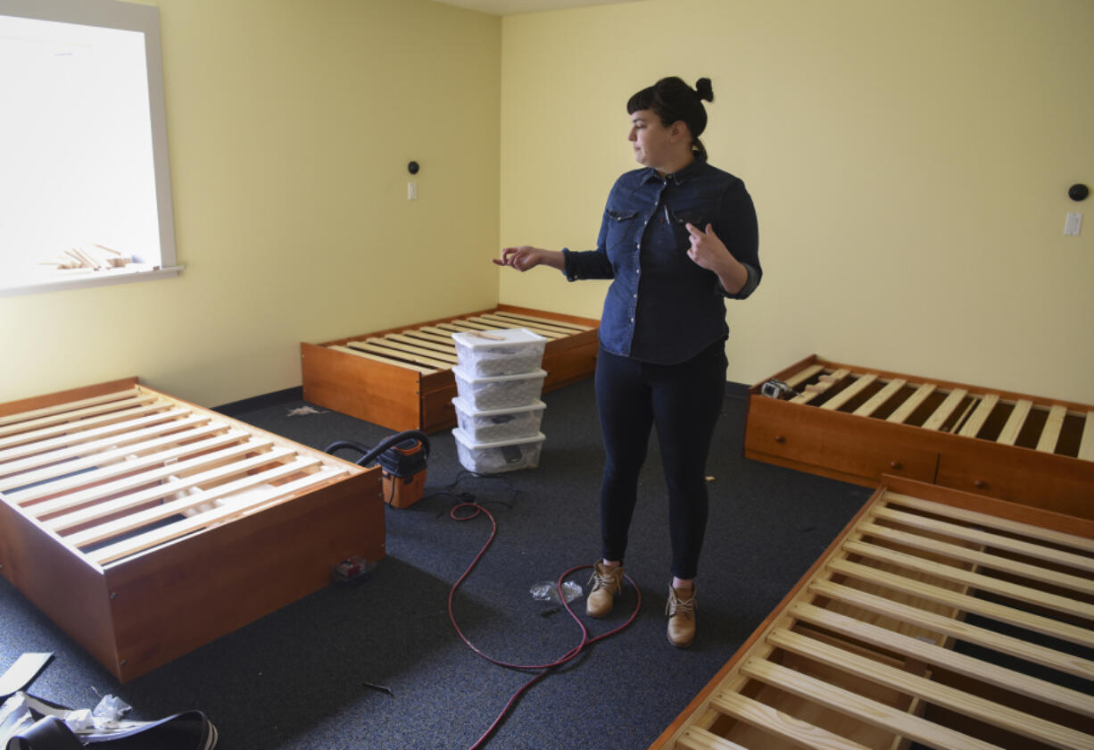 Daybreak Youth Services spokeswoman Alayna Becker gives a tour Tuesday of the evaluation and treatment unit at the new Daybreak facility opening in Brush Prairie in June. The 12-bed evaluation and treatment unit will provide adolescents in crisis with stabilizing mental health treatment.