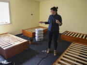 Daybreak Youth Services spokeswoman Alayna Becker gives a tour Tuesday of the evaluation and treatment unit at the new Daybreak facility opening in Brush Prairie in June. The 12-bed evaluation and treatment unit will provide adolescents in crisis with stabilizing mental health treatment.