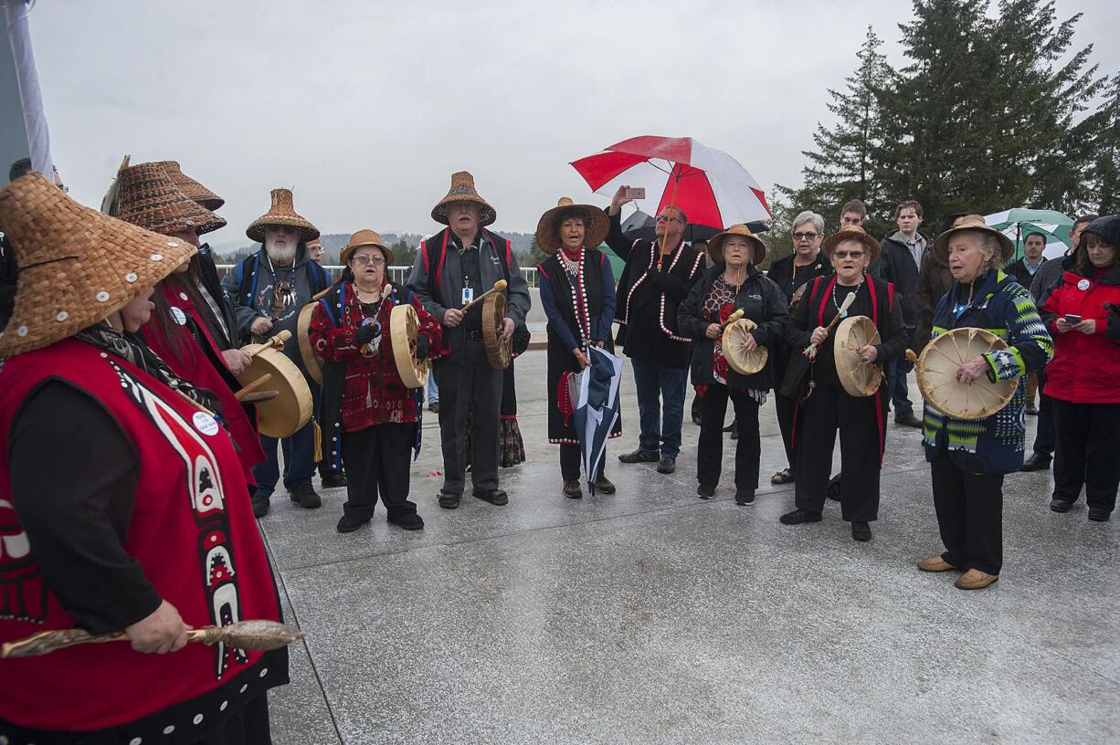 Members of the Cowlitz drum group celebrate the new Interstate 5 exchange in La Center on Tuesday afternoon.