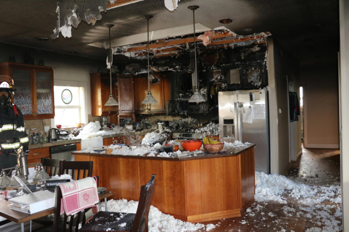 The aftermath of a kitchen fire that spread to an Arnada neighborhood home&#039;s attic Thursday afternoon. No one was hurt, and fire investigators hypothesize a dog trying to take some food from the counter tripped a burner to start the fire.