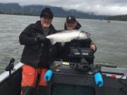 Guides Chris Sessions and Mike Kelly with a spring chinook caught Sunday in the Columbia River near Cathlamet.