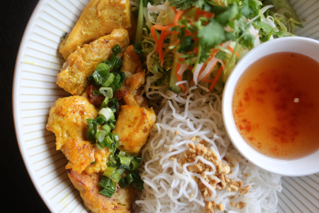 Bun Ca Salmon is served at Pho Green Papaya in Vancouver. The owner of the restaurant reported that 50 percent of orders are Pho, for which the restaurant is named.