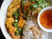 Bun Ca Salmon is served at Pho Green Papaya in Vancouver. The owner of the restaurant reported that 50 percent of orders are Pho, for which the restaurant is named.