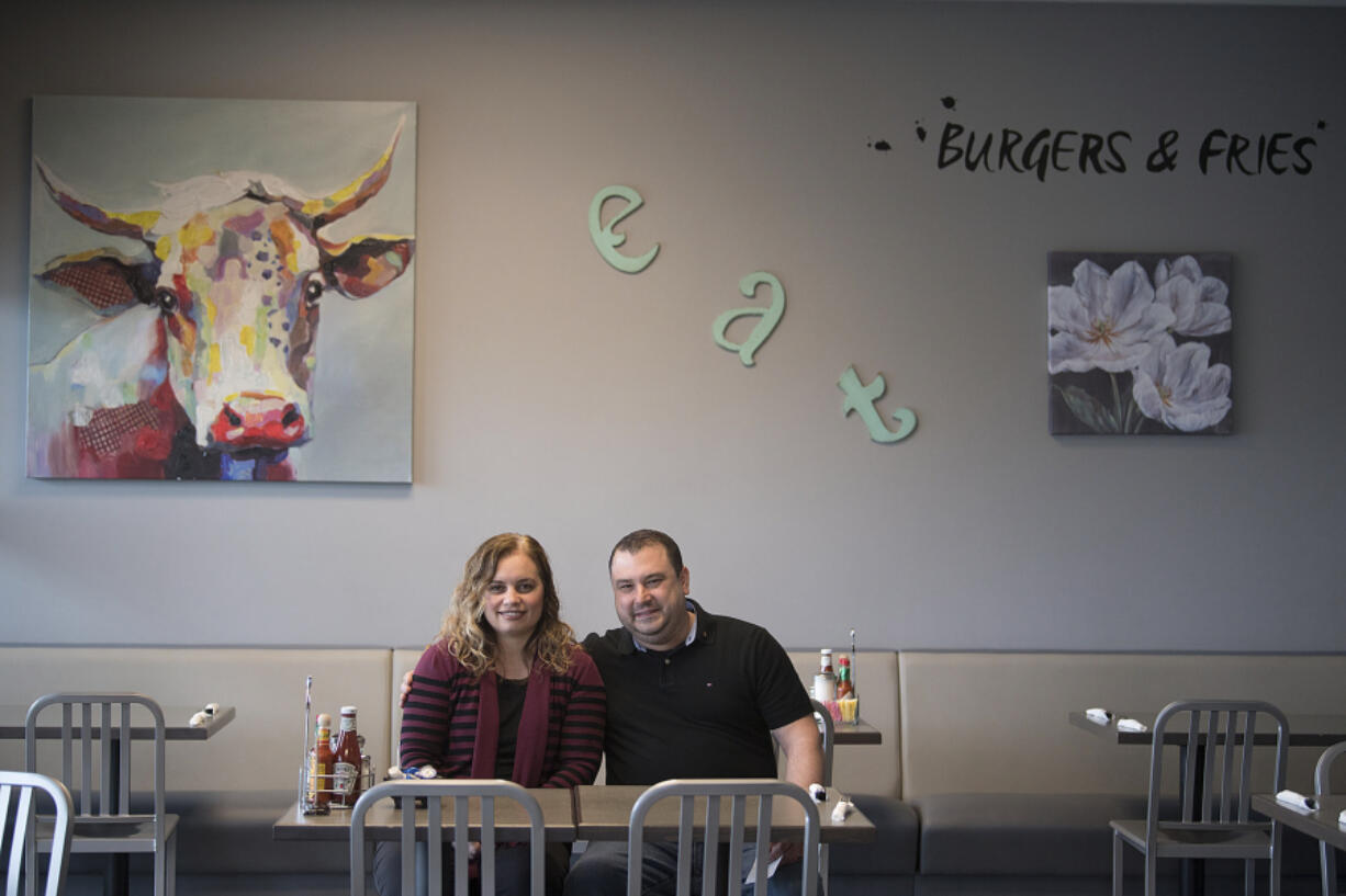 Biscuits Cafe owners Dana and David Ligatich in the dining room of their southeast Vancouver restaurant, which they recently purchased.