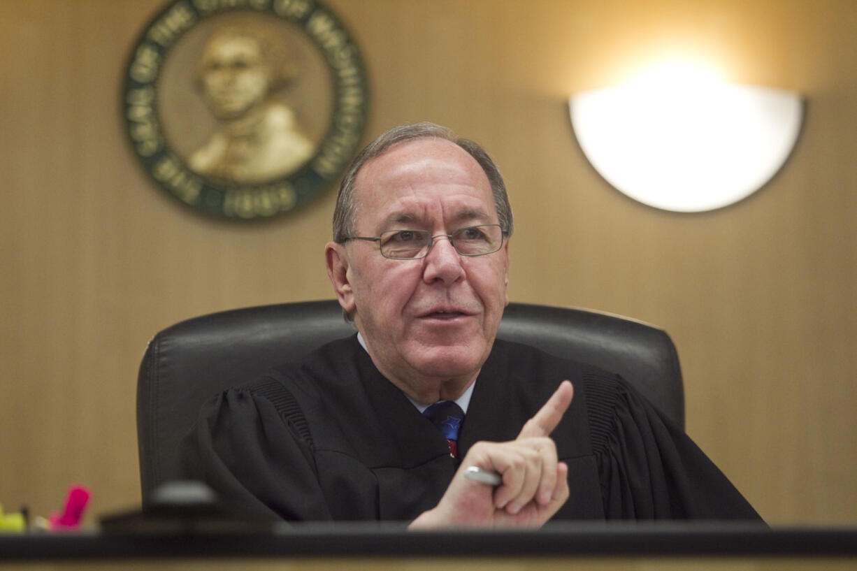 District Court Judge Vernon L. Schreiber presides over the Veterans Court at the Clark County Courthouse in Vancouver on Wed., Sept. 24, 2014. Schreiber, who served a combined 30 years on the District Court bench, died Tuesday morning. He was 74.