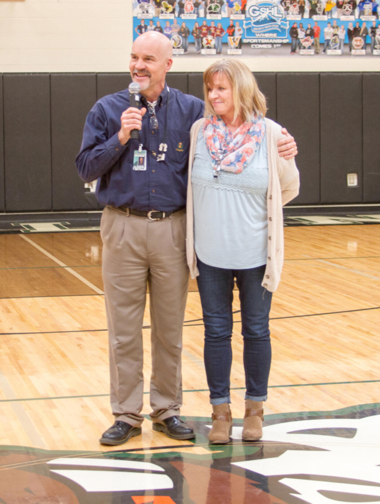 Woodland: Woodland High School Principal John Shoup congratulates Mary Ann Sturdivan, school counselor, for earning the 2017 Classified School Employee of the Year for the Educational Service District 112 region.