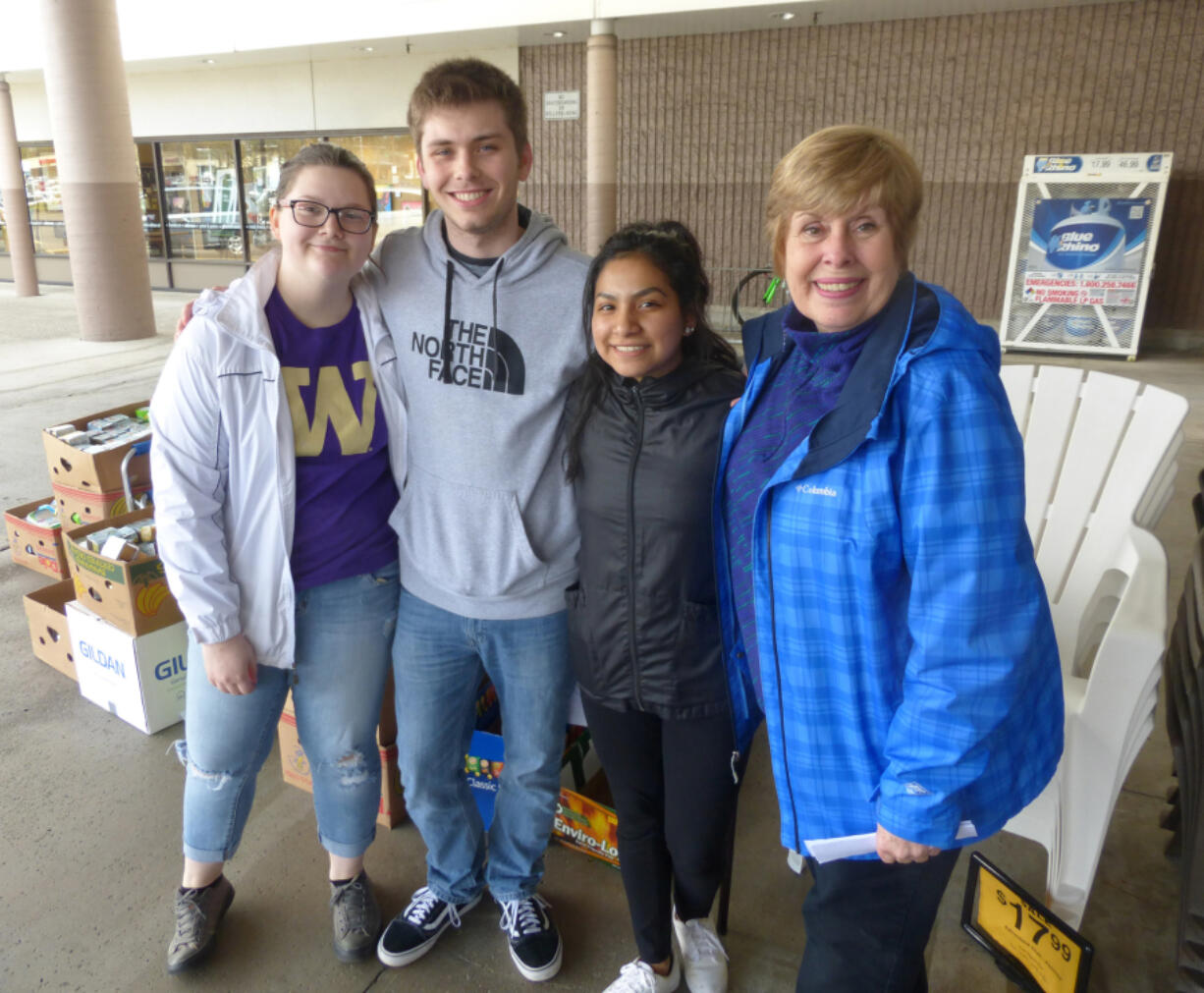 Cascade Park West: Henrietta Lacks Health and Bioscience High School Key Club members, from left, Taylor Smith, Alex Harteloo and Melissa Hernandez and Patty Downey of Cascade Park Kiwanis at their Baby Food Drive, which brought in 732 pounds of baby food for the Clark County Food Bank and 115 pounds of diapers for the Salvation Army.