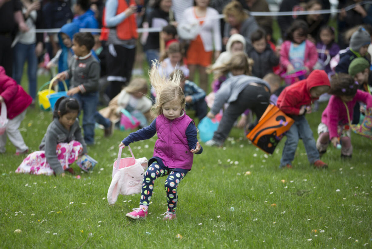 A couple of thousand people showed up Sunday at Camas&#039; Crown Park for the city&#039;s annual Easter egg hunt. The event offered more than 14,000 eggs for different age groups to scoop up. (Randy L.