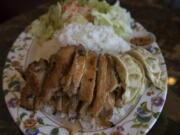 There&#039;s plenty of flavor in the chicken and gyoza combo at Soy Grill Teriyaki in Southeast Vancouver.