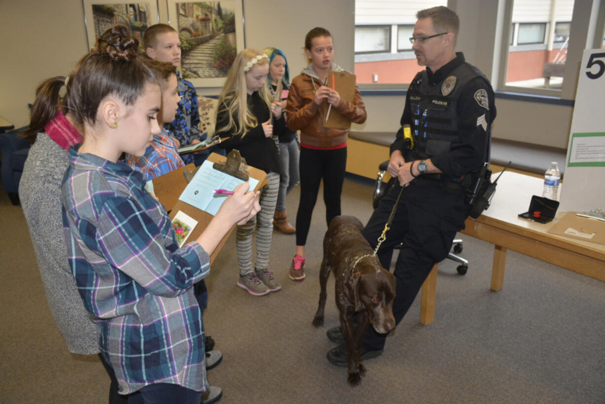 Washougal: K-9 Officer Jeff Galloway attends Gause Elementary School&#039;s first Career Day, where students were shown how skills they&#039;re learning in school can translate in different professions.