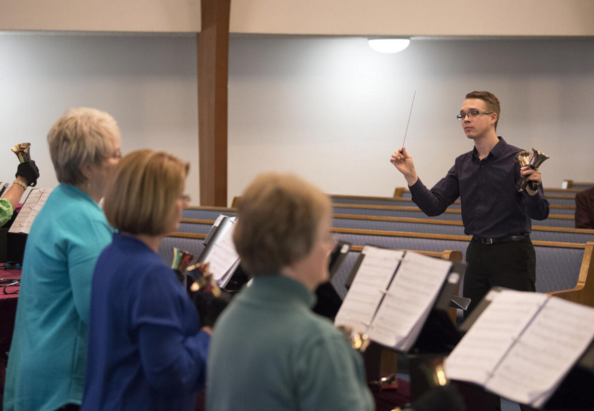 Salmon Creek United Methodist Church only meant to hire a vocal music director when it found Matt Compton. It turns out that Compton, 22, is an accomplished handbell ringer and composer. Here, he leads the church handbell choir through rehearsals for Easter services. He&#039;ll offer free public handbell workshops on Saturday.