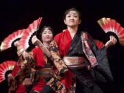 Kikuyo Jurgens, in the foreground, performs with Dance Leo, a Japanese dance ensemble, in Gaiser Hall at Clark College during the college's 2017 Sakura Festival on Thursday.