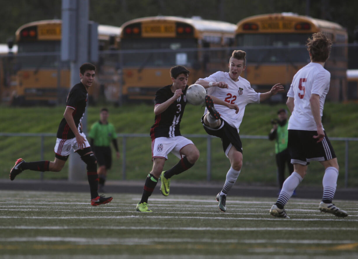 Union's Miguel De La Melena (3) battles Camas' Tybalt Thornberry (22) for the ball in a match Friday.