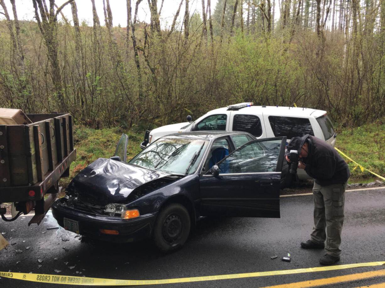 Two people were taken into custody Thursday after a driver allegedly tried to run over a Clark County sheriff's deputy. The deputy fired one shot during the incident and major crimes detectives are investigating.