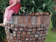 Ridgefield: Shelagh and Peter Kaseburg&#039;s 5-foot-tall planter and mailbox can hold 200 tulips, and one Ava Greer, 5, who lives near the Kaseburg&#039;s.