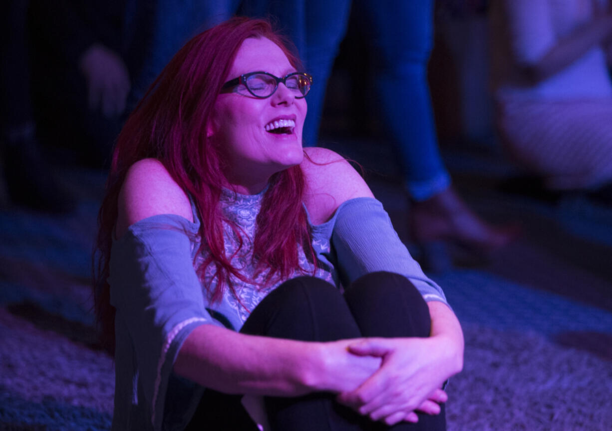 Linda Barnett reacts during a Sunday service April 2 at Bethesda Church. &quot;The love here is real,&quot; she said. &quot;This is a family.&quot; (Photos by Randy L.