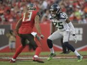 Seahawks general manager John Schneider acknowledged the team has listened to trade offers regarding cornerback Richard Sherman (25), but downplayed that a deal may actually happen.