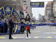 Geoffrey Kirui, of Kenya, crosses the finish line to win the 121st Boston Marathon on Monday in Boston.