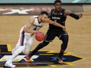 Gonzaga&#039;s Nigel Williams-Goss (5) drives against South Carolina&#039;s Duane Notice during the second half in the semifinals of the Final Four NCAA college basketball tournament, Saturday, April 1, 2017, in Glendale, Ariz.