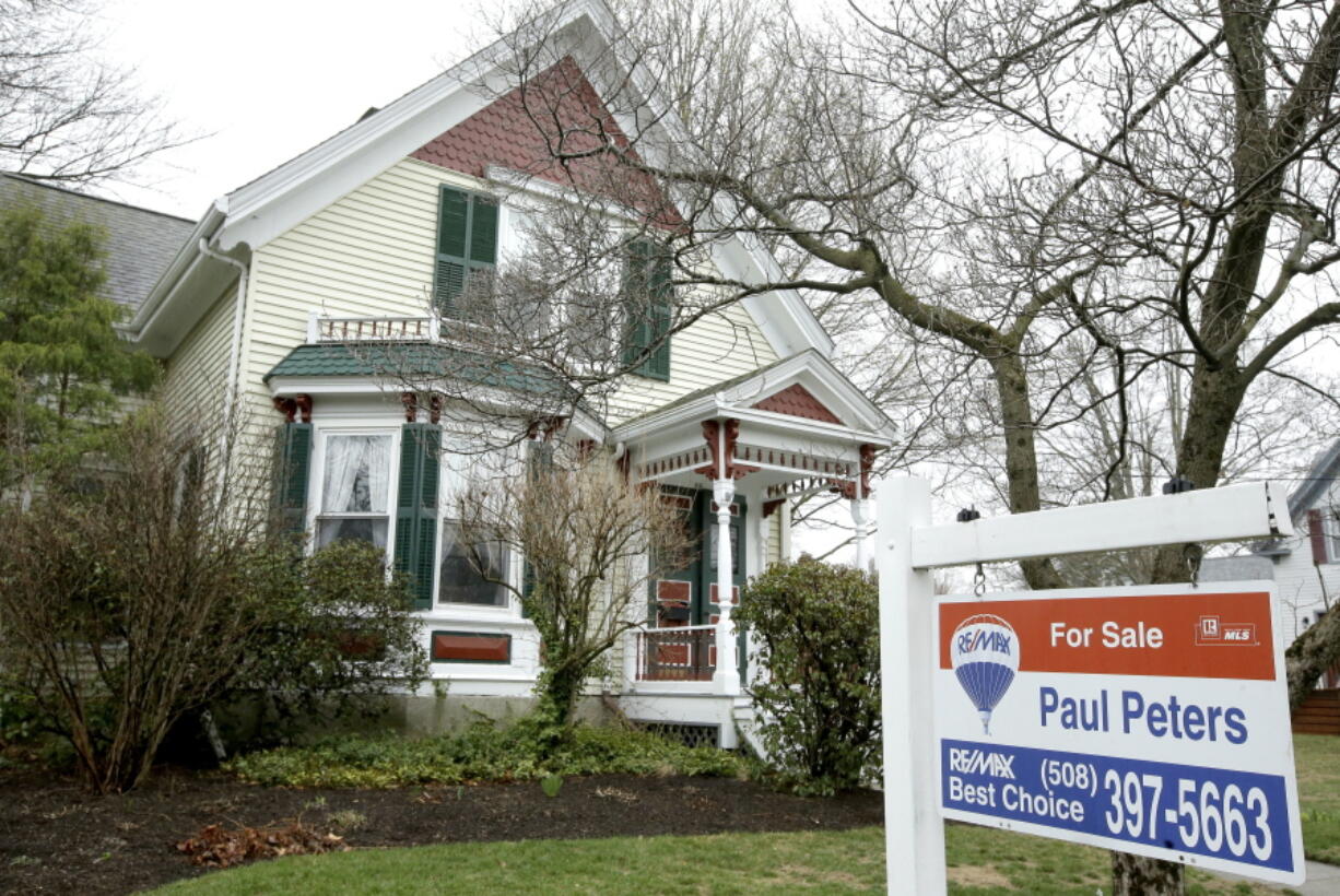 TA home for sale is shown Wednesday, April 12, 2017, in Natick, Mass. Americans purchased homes in March at the fastest pace in over a decade, a strong start to the traditional spring buying season.