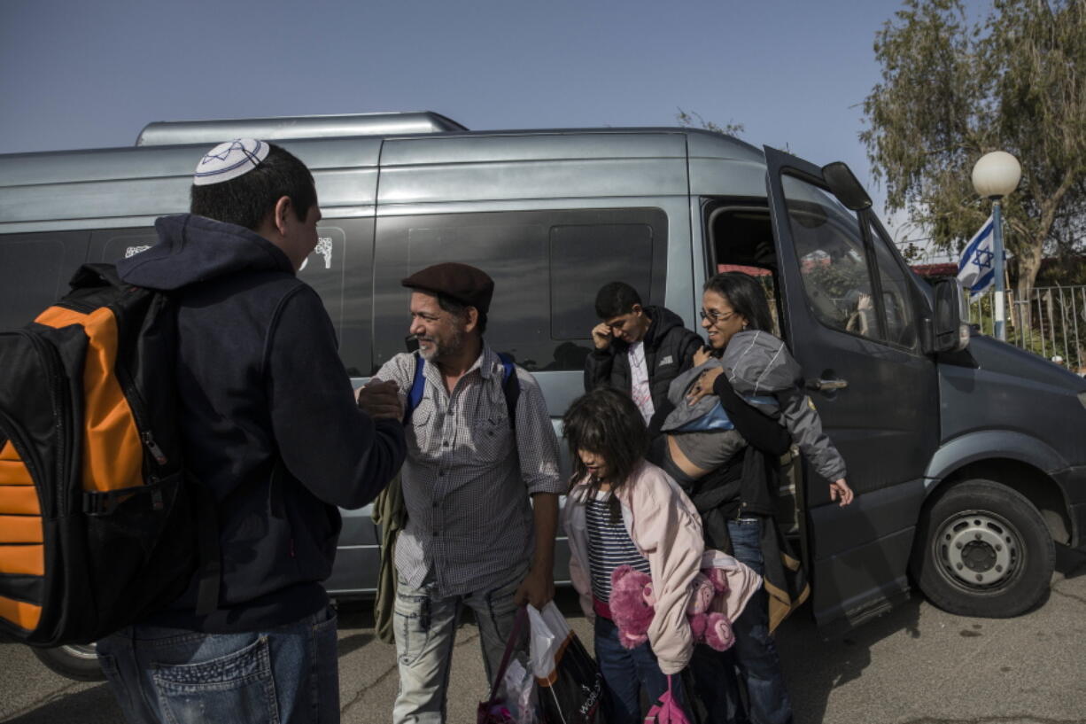 Venezuelan Jewish converts arrive at an airport in Tel Aviv, Israel, March 23. For a group of nine struggling Venezuelan converts to Judaism their torturous journey to a better life in the promised land finally brought them to Israel on Thursday. They immigrated under the Law of Return, which gives Jews the world over the right to settle in Israel.