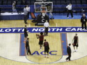 Maryland players practice for the Atlantic Coast Conference men's NCAA college basketball tournament at Bobcats Arena in Charlotte, N.C., in 2008.  The NCAA says it will consider North Carolina as a host for championship events again after the state rolled back a law that limited protections for LGBT people. In a statement Tuesday, April 4, 2017, the governing body said its Board of Governors had reviewed moves to repeal repealed the so-called &quot;bathroom bill&quot; and replace it with a compromise law.