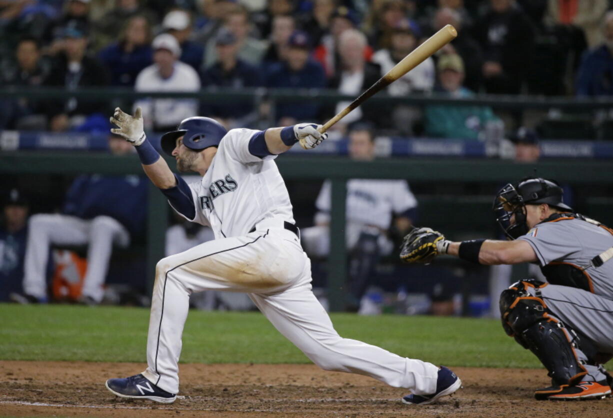 Seattle Mariners&#039; Mitch Haniger follows through on a double against the Miami Marlins during the ninth inning of a baseball game to break up a combined no-hitter, Tuesday, April 18, 2017, in Seattle. The Marlins won 5-0. (AP Photo/Ted S.